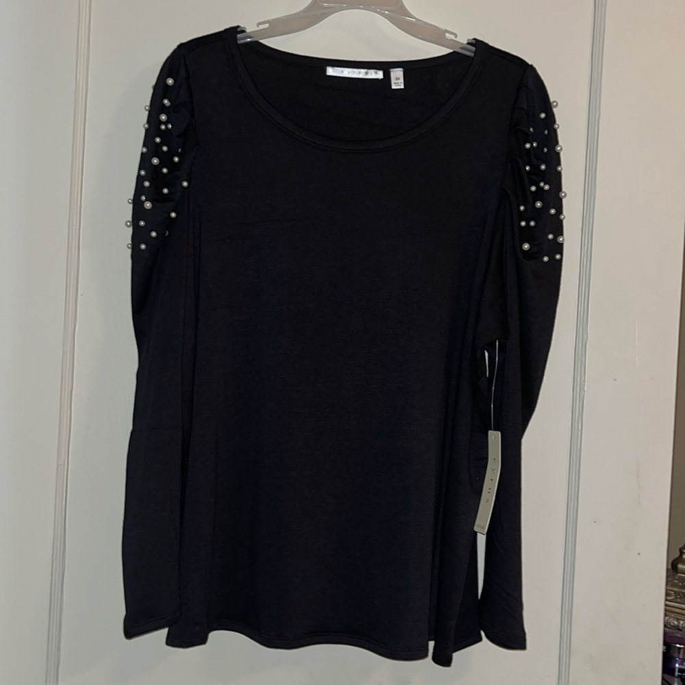 Cyrus black long sleeve top with pearl bead accent on sleeves